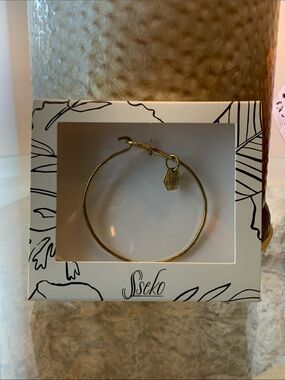 Sseko Gold Tone Bracelet